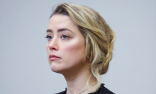 Actress Amber Heard looks solemnly ahead at the defamation trial Heard vs. Depp. 