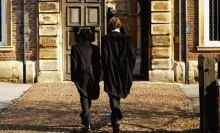 Pupils at Eton College hurry between lessons March 1, 2004 wearing the school uniform of tailcoats and starched collars, in Eton, England.