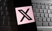 X logo on mobile device