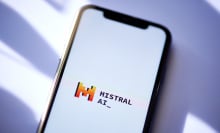 The Mistral AI logo on a smartphone