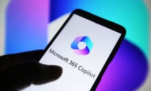 Microsoft 365 Copilot logo is seen on a smartphone screen.