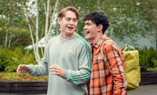 Nick (Kit Connor) and Charlie (Joe Locke) smile in the TV show "Heartstopper".