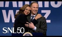 Maya Rudolph as Kamala Harris embracing Andy Samberg as Doug Emhoff at a podium in the 'SNL' cold open