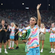 Alex Morgan #13 of San Diego Wave FC waves to fans after the game against North Carolina Courage at Snapdragon Stadium on September 08, 2024 in San Diego, California. 