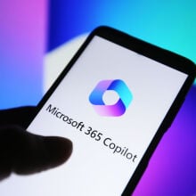 Microsoft 365 Copilot logo is seen on a smartphone screen.