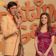 Tony Hale and Anna Kendrick stand on the set of the '70s dating show "The Dating Game" in the film "Woman of the Hour."