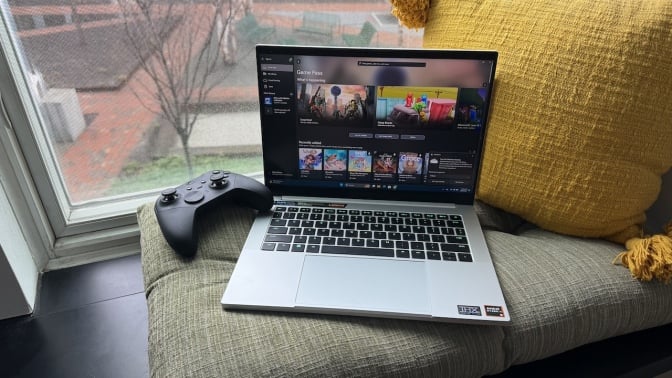 Razer Blade 14 sitting on a window sill