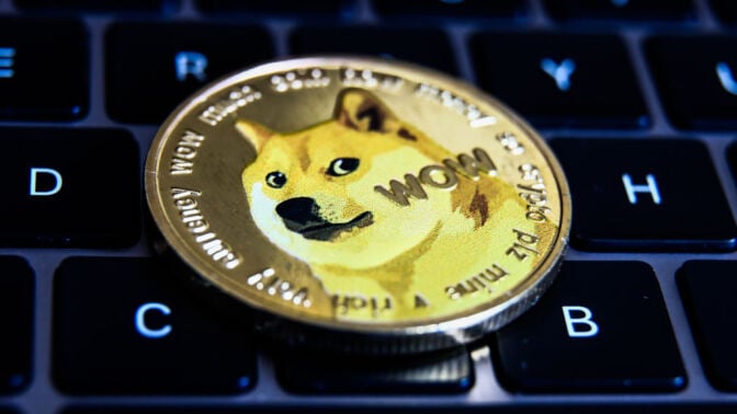 A dogecoin on a keyboard.