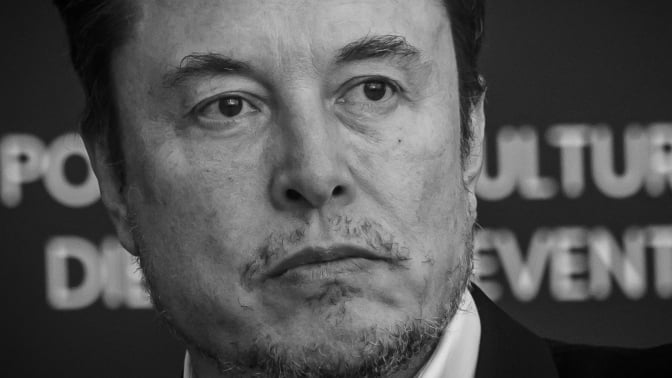 Elon Musk looking grim in black and white. 