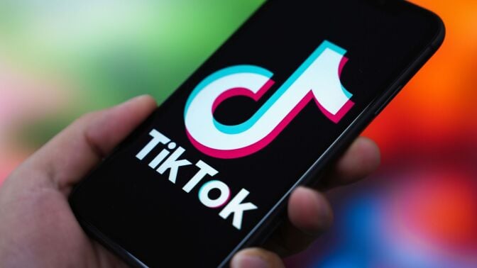 In this photo illustration, the TikTok logo is displayed on the screen of a smartphone.