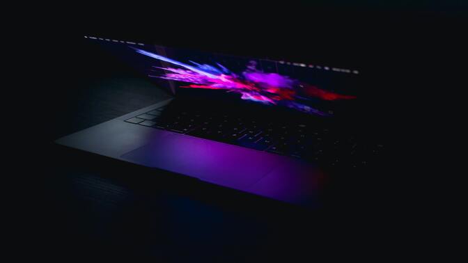 Laptop in dark room