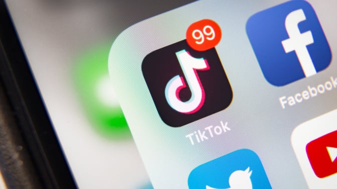 TikTok and Facebook application on screen Apple iPhone XR