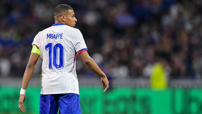 Kylian Mbappé of France looks on