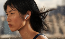 A person working out with a pair of Apple AirPods