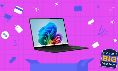 microsoft surface laptop on bright pink background